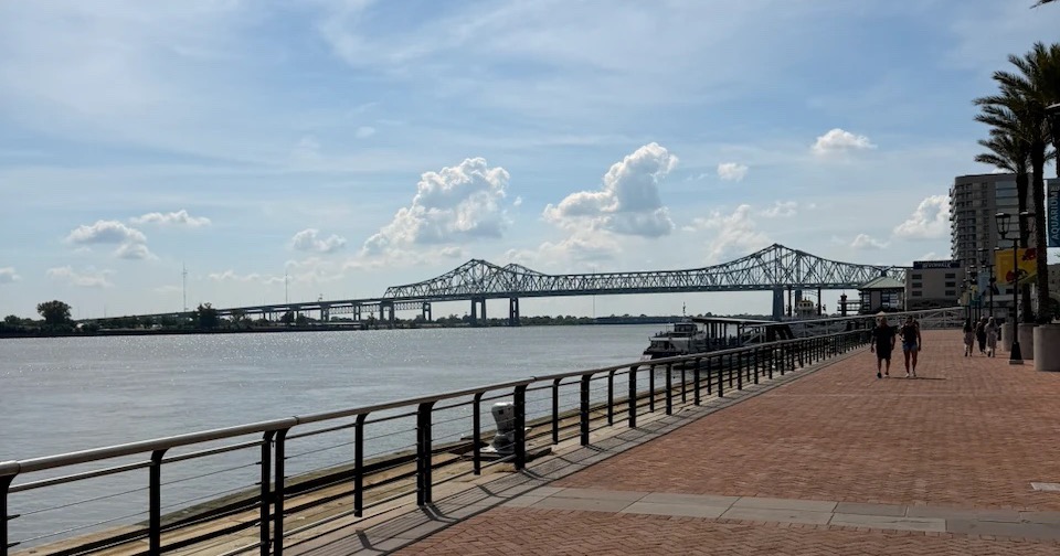 Mississippi riverfront in New Orleans with the Crescent City Connection bridge